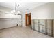 Dining room with tile floors and wall-mounted white cabinetry at 306 12Th Ave, Indian Rocks Beach, FL 33785