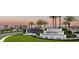 Elegant community entrance showcasing the 'Valencia Ridge' sign, a tiered water feature and lush landscaping at 3198 Malta Ave, Wesley Chapel, FL 33543