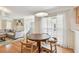 Bright dining area adjacent to the living room with great natural light at 3205 W De Leon St # F, Tampa, FL 33609