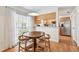Inviting dining area with a view and hardwood floors at 3205 W De Leon St # F, Tampa, FL 33609