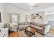 Cozy living room featuring hardwood floors and natural light at 3205 W De Leon St # F, Tampa, FL 33609