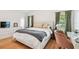 Serene bedroom with hardwood floors and modern furnishings at 3205 W De Leon St # F, Tampa, FL 33609