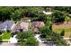 This aerial view showcases a beautiful neighborhood with mature trees and well-maintained homes at 3323 Anna George Dr, Valrico, FL 33596