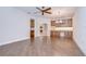 Spacious living room with wood floors, built-in cabinets and wet bar perfect for entertaining at 3323 Anna George Dr, Valrico, FL 33596