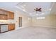 Spacious living room with custom ceiling, cabinets and beverage refrigerator at 3323 Anna George Dr, Valrico, FL 33596
