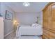 Inviting bedroom featuring a ceiling fan, a bed, and carpeted floors at 3456 Castle Stone Ct, Valrico, FL 33594