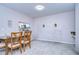 Inviting dining room featuring a wooden table set, neutral walls, and stylish decorations at 3456 Castle Stone Ct, Valrico, FL 33594