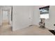 Bright bedroom features neutral tile flooring, ample natural light, and a cozy cat tree at 3501 63Rd N St, St Petersburg, FL 33710