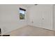 Bright bedroom features neutral tile flooring, ample natural light, and white walls at 3501 63Rd N St, St Petersburg, FL 33710