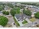 This aerial shot shows the home's location amid a mix of residential and commercial development surrounded by trees at 3817 W San Nicholas St, Tampa, FL 33629