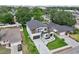 Beautifully designed two-story home with well-manicured lawn and landscaping, featuring dual garages and modern exterior at 3817 W San Nicholas St, Tampa, FL 33629