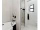 Modern bathroom featuring a freestanding tub, glass-enclosed shower, and sleek fixtures for a spa-like experience at 3817 W San Nicholas St, Tampa, FL 33629