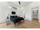 Modern bedroom with a dark color palette, and closet space at 3817 W San Nicholas St, Tampa, FL 33629