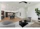 Bright living room blends with dining area and modern kitchen, offering versatile living space at 3817 W San Nicholas St, Tampa, FL 33629