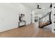 Bright and airy living room features an open floor plan, modern staircase, and stylish decor at 3817 W San Nicholas St, Tampa, FL 33629