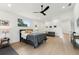 Bright primary bedroom has hardwood floors with multiple seating spaces at 3817 W San Nicholas St, Tampa, FL 33629