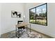 Bright home office with a large window offering scenic views and ample natural light at 3817 W San Nicholas St, Tampa, FL 33629