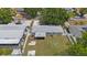 Aerial view of backyard and home showing patio, deck, and full yard surrounded by a fence at 4558 23Rd N Ave, St Petersburg, FL 33713