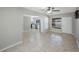 Open concept living room with tile flooring and large windows at 4558 23Rd N Ave, St Petersburg, FL 33713