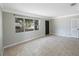 Bright living room with large window offering natural light and tiled flooring throughout at 4558 23Rd N Ave, St Petersburg, FL 33713