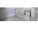 Open living area with tiled floor leading to the kitchen at 4558 23Rd N Ave, St Petersburg, FL 33713