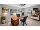 Comfortable home office space with two windows, potted plants, and stylish decor at 4558 23Rd N Ave, St Petersburg, FL 33713