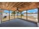 Enclosed back patio with ceiling fan overlooking a fenced backyard at 4558 23Rd N Ave, St Petersburg, FL 33713