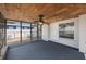 Enclosed back patio with ceiling fan and access to fenced backyard at 4558 23Rd N Ave, St Petersburg, FL 33713