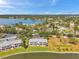Stunning aerial view of a community with lake access and lush green surroundings near the serene waterfront at 4734 Cobia Se Dr # A, St Petersburg, FL 33705