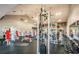 Well-equipped gym featuring various exercise machines, weights, and mirrors for a complete fitness experience at 4734 Cobia Se Dr # A, St Petersburg, FL 33705