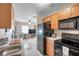 Bright kitchen featuring stainless steel appliances and an open layout that flows into the living area at 4734 Cobia Se Dr # A, St Petersburg, FL 33705