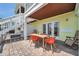 Patio with furniture near the water with direct access to house at 4734 Cobia Se Dr # A, St Petersburg, FL 33705