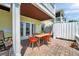 Outdoor patio area featuring dining table and chairs on brick pavers with a view at 4734 Cobia Se Dr # A, St Petersburg, FL 33705