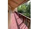 Cozy balcony with wooden decking, providing a private outdoor space at 4967 Steel Dust Ln, Lutz, FL 33559