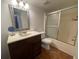 Bathroom with vanity, tile floor, and walk-in shower at 4967 Steel Dust Ln, Lutz, FL 33559