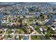 Aerial view of a waterfront community with numerous canals and lush landscaping at 5144 Cedarbrook Ln, Hernando Beach, FL 34607