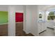 Hallway shot of the house featuring a bathroom with double sinks at 5144 Cedarbrook Ln, Hernando Beach, FL 34607