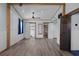 Large bedroom with wood floors, wood beam accents and multiple closets and bathrooms at 5144 Cedarbrook Ln, Hernando Beach, FL 34607