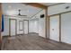 Well lit bedroom with multiple closets and wood floors at 5144 Cedarbrook Ln, Hernando Beach, FL 34607