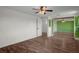 Bedroom featuring hardwood floors and an ample closet at 5144 Cedarbrook Ln, Hernando Beach, FL 34607