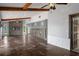Bright and open living space with stone floors, and seamless access to other living areas at 5144 Cedarbrook Ln, Hernando Beach, FL 34607