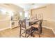 Dining room with a table set for six and elegant decor at 5317 Pagnotta Pl, Lutz, FL 33558