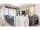 Comfortable living room featuring a large window and furniture at 5317 Pagnotta Pl, Lutz, FL 33558