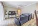 Spacious living room with a ceiling fan and lots of natural light at 5317 Pagnotta Pl, Lutz, FL 33558