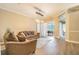 Cozy living room with comfortable seating and natural light at 5317 Pagnotta Pl, Lutz, FL 33558