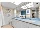 Bright bathroom with double sinks, ample counter space, and tiled floors at 535 Sandy Hook, Palm Harbor, FL 34683