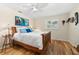 Cozy bedroom with wood accents, stylish decor, and ample natural light at 535 Sandy Hook, Palm Harbor, FL 34683