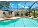 Beautiful screened-in pool and patio area offers outdoor living and entertaining opportunities at 535 Sandy Hook, Palm Harbor, FL 34683