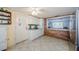 Functional kitchen space with white cabinetry and a view to the living room at 6111 2Nd Ave, New Port Richey, FL 34653