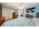 Serene main bedroom with ample closet space and a relaxing ambiance at 6111 2Nd Ave, New Port Richey, FL 34653